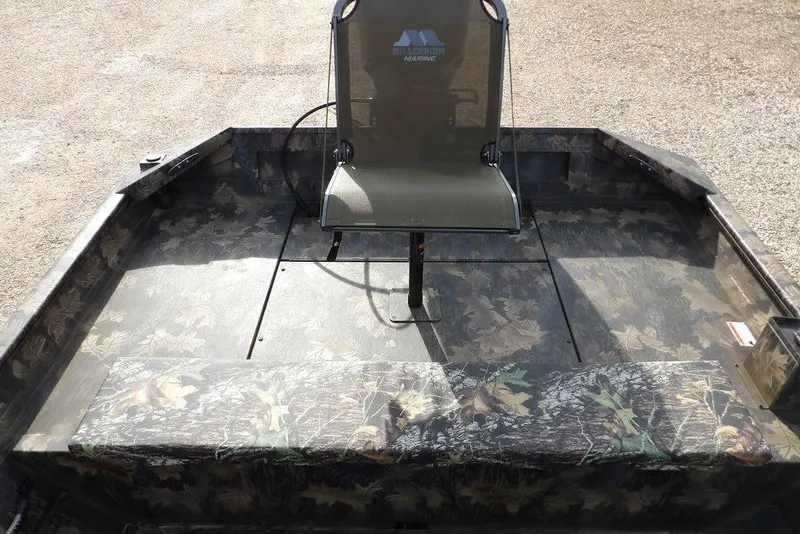 Slide: The Image of 2026 Crestliner 1870 Retriever FCC boat interior with camouflage seating and flooring. - 13