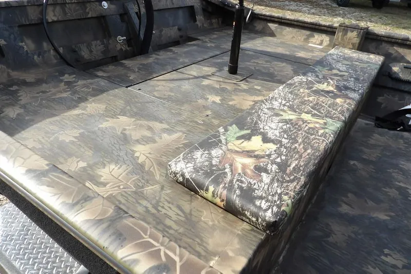 Slide: The Image of 2026 Crestliner 1870 Retriever FCC boat interior with camouflage seating and flooring. - 14