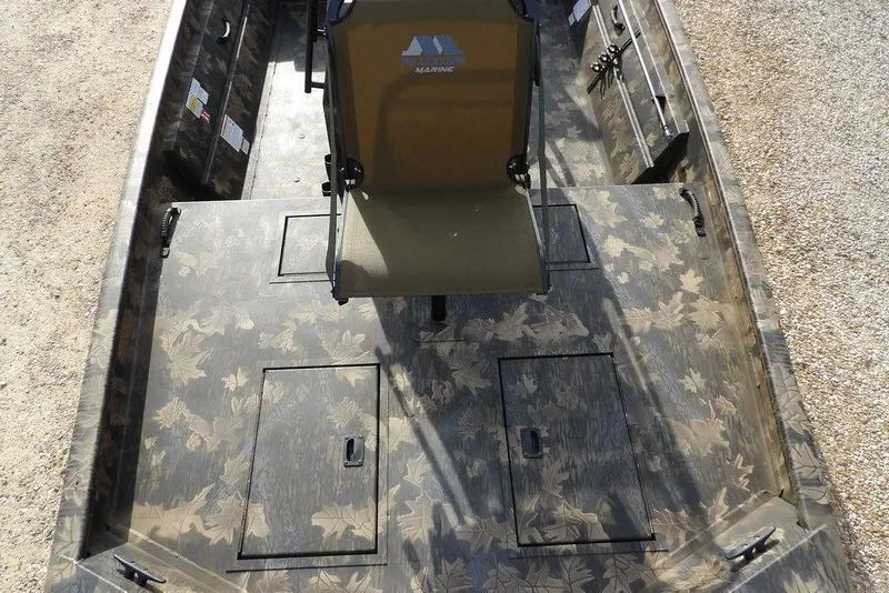 Slide: The Image of 2026 Crestliner 1870 Retriever FCC boat interior with camouflage pattern and central seat. - 27