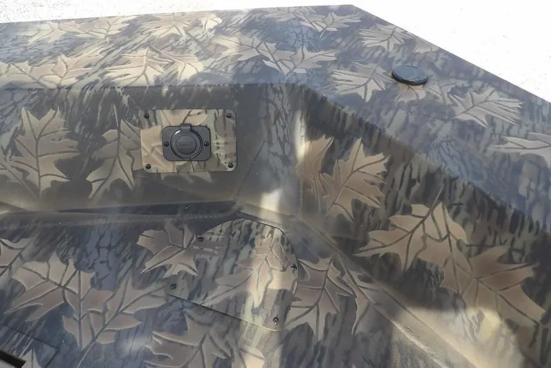 Slide: The Image of 2026 Crestliner 1870 Retriever FCC boat with leaf camouflage pattern. - 28