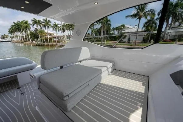 Slide: The Image of Luxurious interior of 2022 Azimut Atlantis 45 yacht with modern seating and waterfront view. - 23