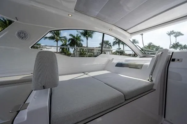 Slide: The Image of Interior of 2022 Azimut Atlantis 45 yacht with modern seating and large windows. - 24