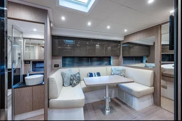 Slide: The Image of Luxurious interior of 2022 Azimut Atlantis 45 yacht with modern seating and elegant design. - 32