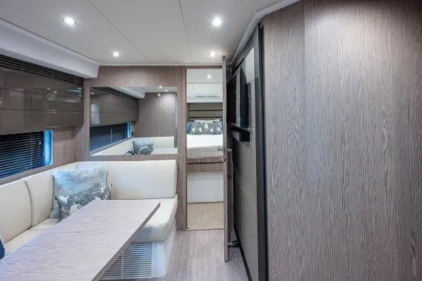 Slide: The Image of Luxurious interior of 2022 Azimut Atlantis 45 yacht with modern seating and elegant design. - 33