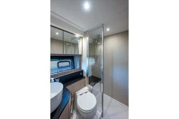 Slide: The Image of Luxurious bathroom in 2022 Azimut Atlantis 45 yacht with modern fixtures and sleek design. - 37
