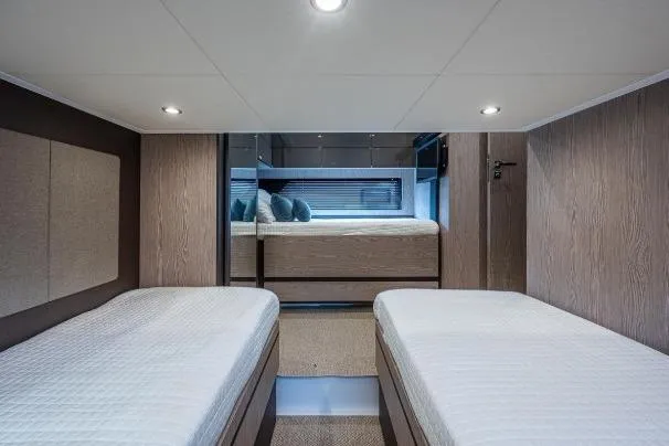 Slide: The Image of Interior cabin of 2022 Azimut Atlantis 45 yacht with twin beds and modern design. - 39