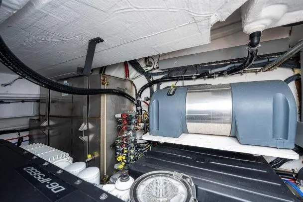 Slide: The Image of Engine room of 2022 Azimut Atlantis 45 yacht, showcasing mechanical components and wiring. - 42