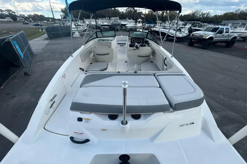 Slide: The Image of 2020 Sea Ray SPX 210 Outboard boat with spacious seating and sleek design. - 13