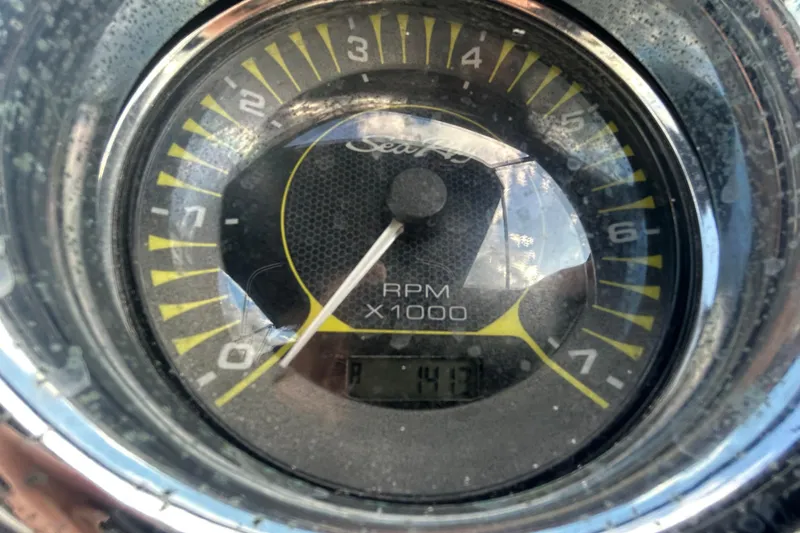 Slide: The Image of Close-up of a 2020 Sea Ray SPX 210 Outboard tachometer displaying RPM. - 23
