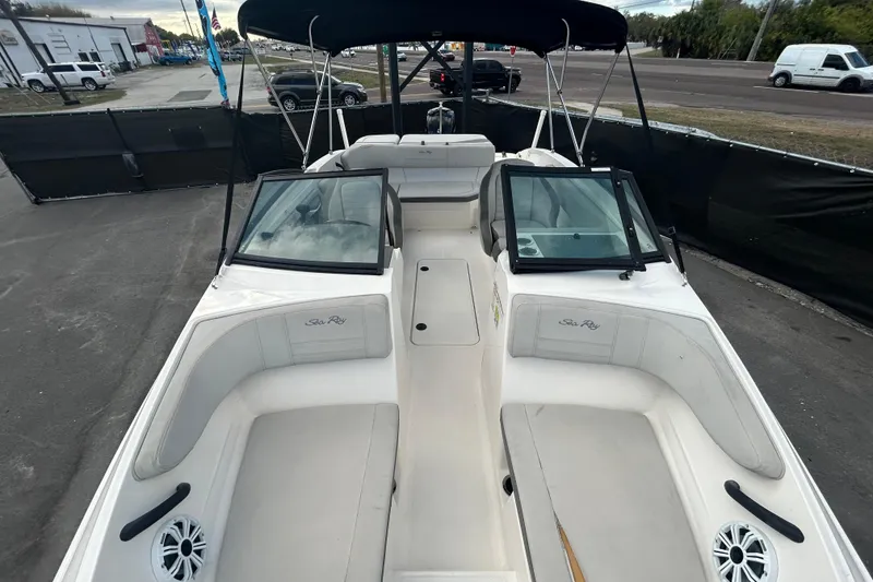 Slide: The Image of 2020 Sea Ray SPX 210 Outboard boat interior with seating and windshield. - 27