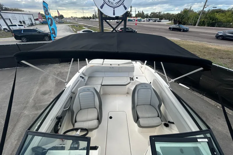 Slide: The Image of 2020 Sea Ray SPX 210 Outboard boat with canopy, parked on a lot. - 29