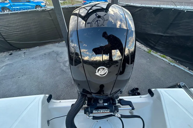Slide: The Image of 2020 Sea Ray SPX 210 Outboard engine with reflective surface and shadow. - 38