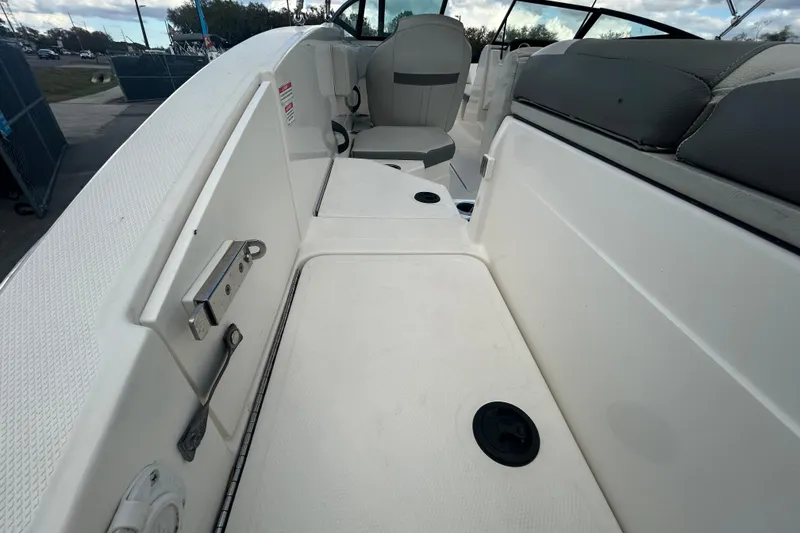 Slide: The Image of 2020 Sea Ray SPX 210 Outboard boat interior, featuring seating and deck details. - 39