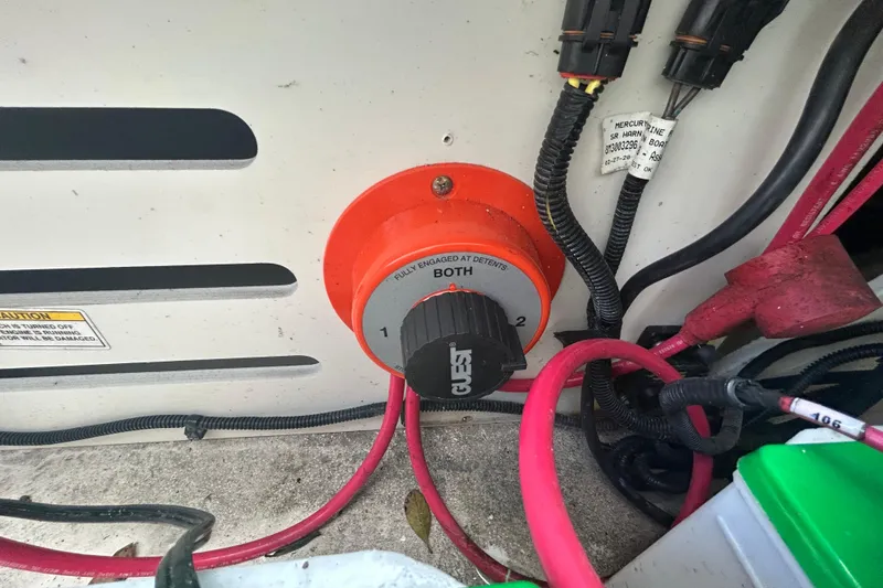 Slide: The Image of Battery switch and wiring in a 2020 Sea Ray SPX 210 Outboard boat. - 44