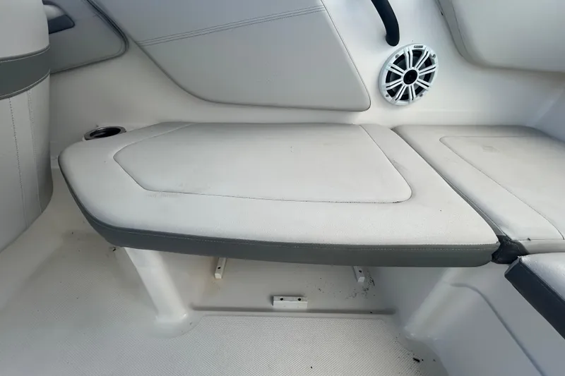 Slide: The Image of Interior seating of 2020 Sea Ray SPX 210 Outboard boat with speaker and cup holder. - 45