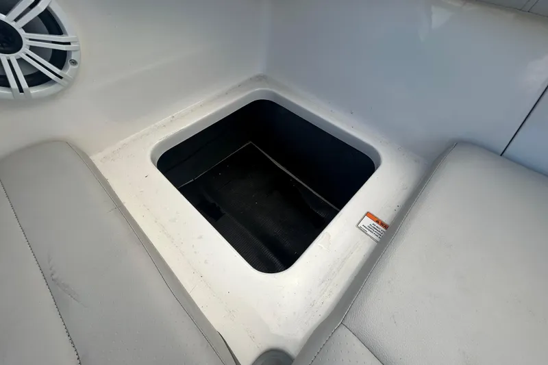 Slide: The Image of Storage compartment in 2020 Sea Ray SPX 210 Outboard boat interior. - 49