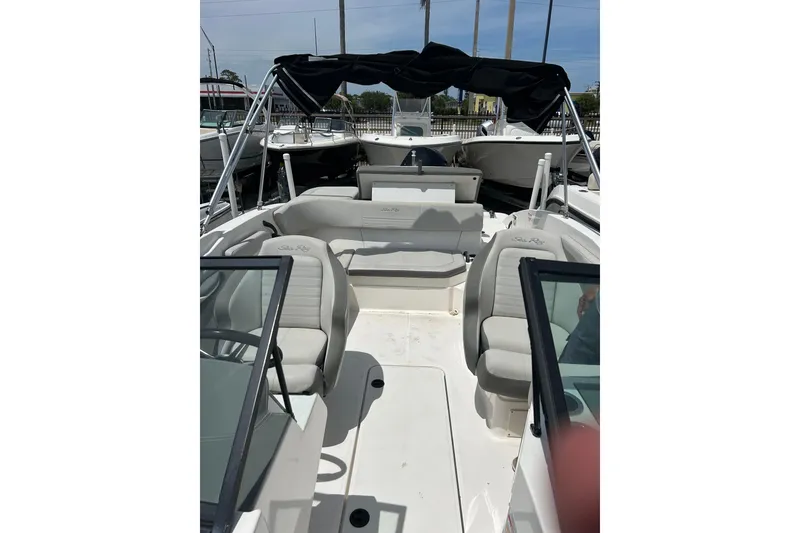 Slide: The Image of 2020 Sea Ray SPX 210 Outboard boat with 150 horsepower engine, parked outdoors. - 5