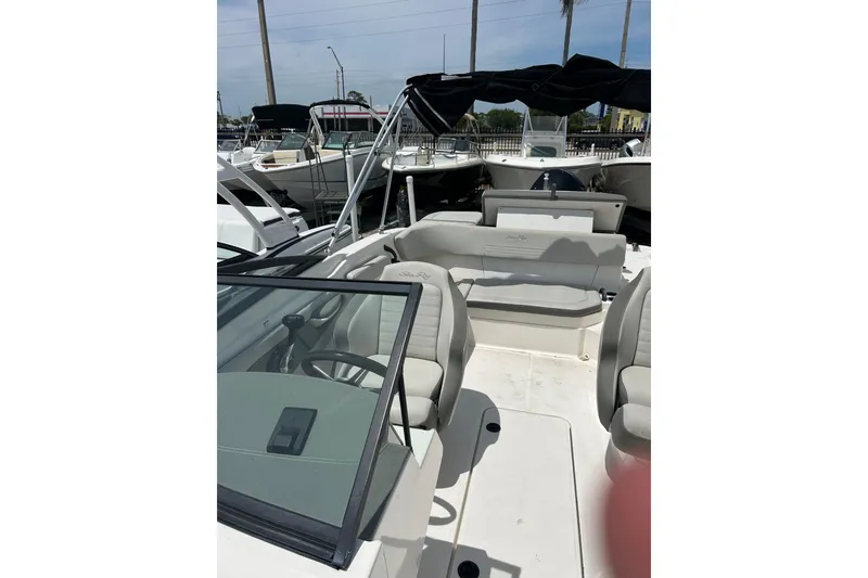 Slide: The Image of 2020 Sea Ray SPX 210 Outboard boat propeller and trailer, rear view. - 6