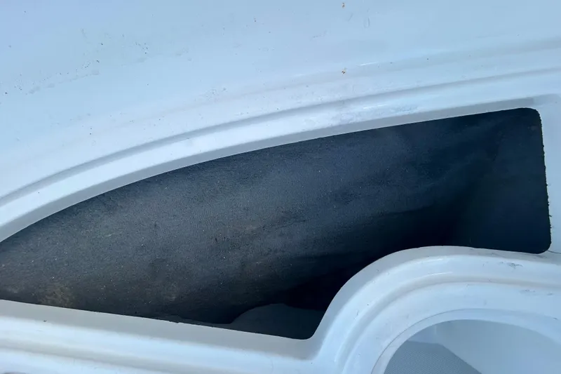 Slide: The Image of 2020 Sea Ray SPX 210 Outboard boat interior detail, featuring sleek white and black design. - 71