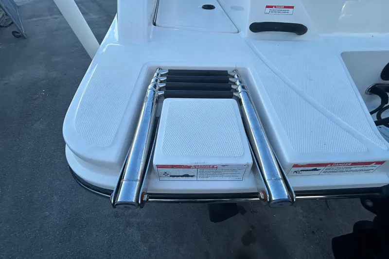 Slide: The Image of Swim platform with ladder on 2020 Sea Ray SPX 210 Outboard boat. - 85