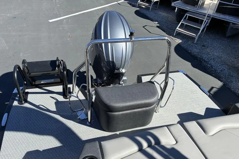 Slide: The Image of 2026 Evotti 521CS boat with motor and seating on a sunny day. - 10