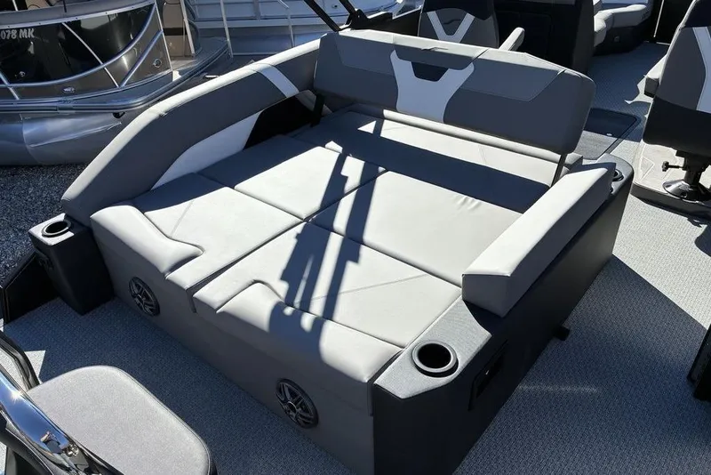 Slide: The Image of Luxurious seating on 2026 Evotti 521CS boat with cup holders and modern design. - 11