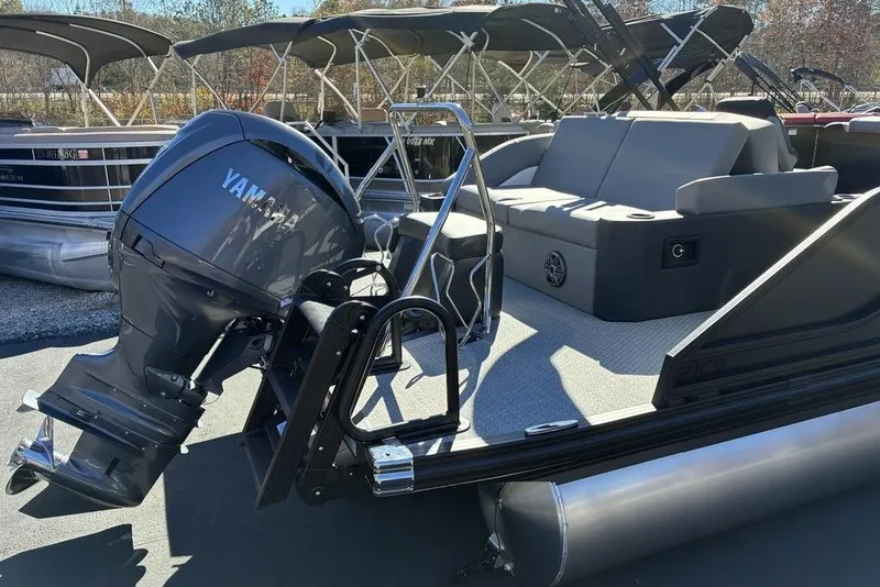 Slide: The Image of 2026 Evotti 521CS pontoon boat with Yamaha outboard motor, featuring spacious seating. - 13