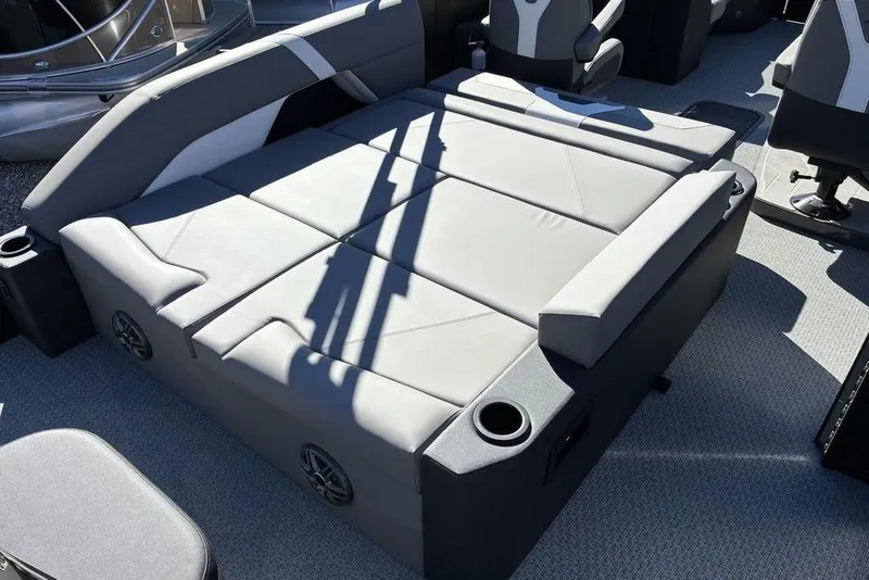 Slide: The Image of Luxurious seating area on 2026 Evotti 521CS boat with cup holders and modern design. - 7