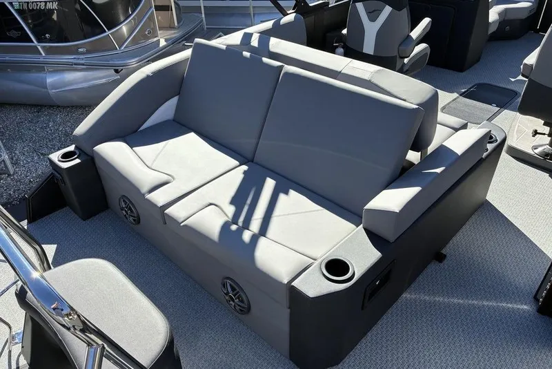 Slide: The Image of Luxurious seating on 2026 Evotti 521CS boat with cup holders and modern design. - 8