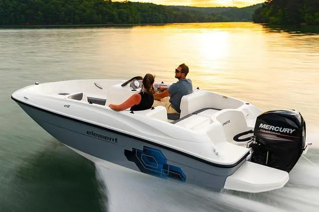 Slide: The Image of 2021 Bayliner Element E16 boat on trailer in marina setting. - 3