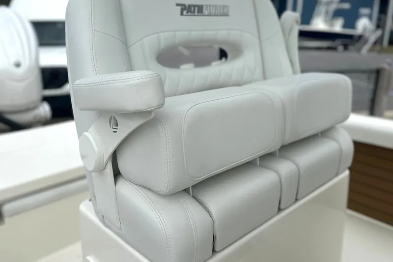Slide: The Image of 2024 Pathfinder 2400 TRS boat seat, featuring luxurious white leather upholstery. - 12