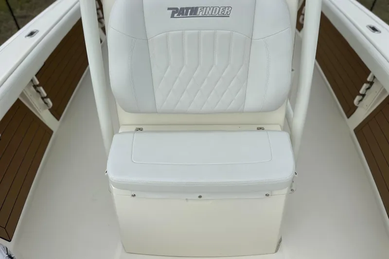 Slide: The Image of 2024 Pathfinder 2400 TRS boat seat with white upholstery and diamond stitching. - 21