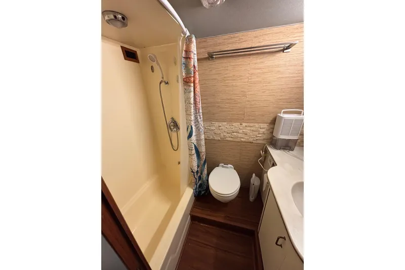 Slide: The Image of Bathroom interior of 1989 Ocean 48 Motor Yacht with shower and toilet. - 18