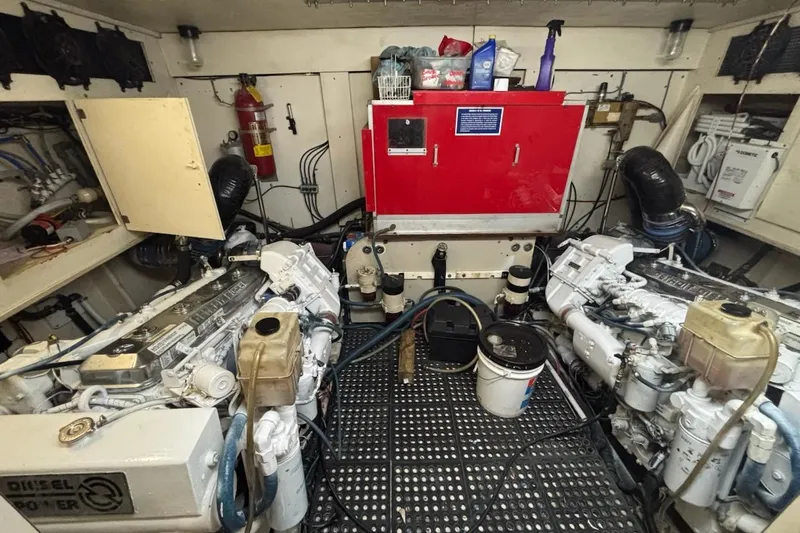 Slide: The Image of Engine room of 1989 Ocean 48 Motor Yacht with dual diesel engines and equipment. - 5