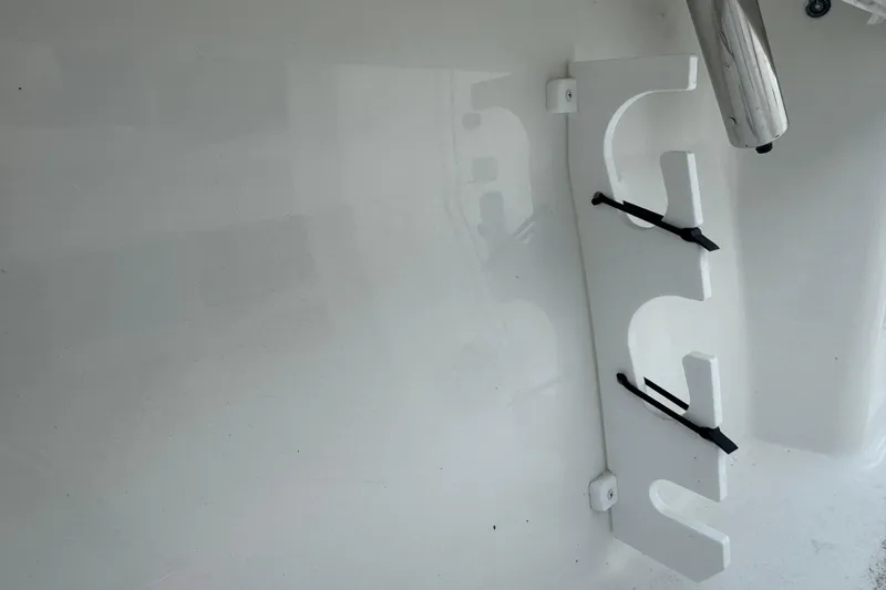 Slide: The Image of Rod holder on a 2026 Parker 180 Coastal boat, featuring sleek white design. - 14