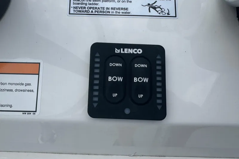 Slide: The Image of Lenco trim tab control panel on Parker 180 Coastal boat, 2026 model. - 21