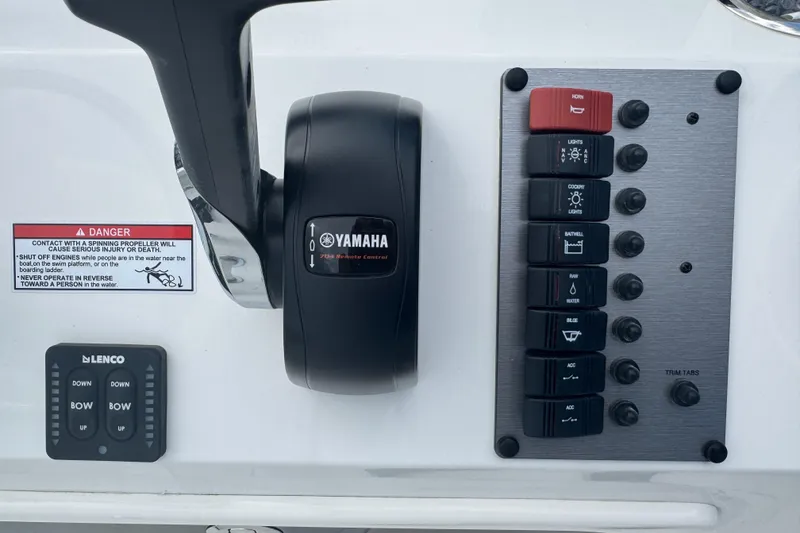 Slide: The Image of Control panel of 2026 Parker 180 Coastal boat with Yamaha throttle and switches. - 22