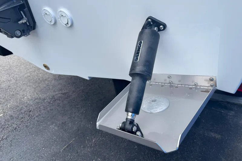Slide: The Image of Trim tab and actuator on a 2026 Parker 180 Coastal boat. - 5