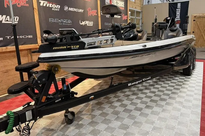 Slide: The Image of 2020 Ranger Z520L boat on display with Minn Kota motor and Ranger Trail trailer. - 5