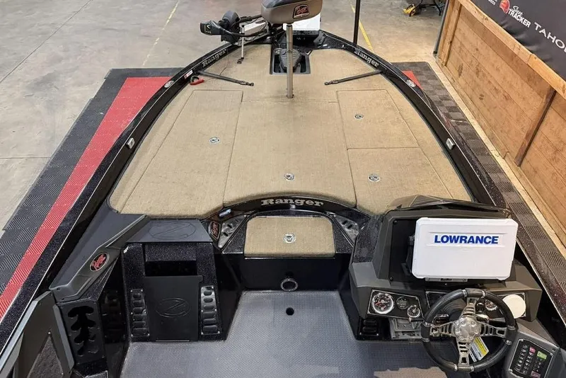 Slide: The Image of 2020 Ranger Z520L boat interior with Lowrance electronics and spacious deck. - 7
