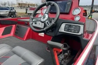Slide: The Image of 2021 Nitro Z19 Pro boat interior with steering wheel and dashboard controls. - 4