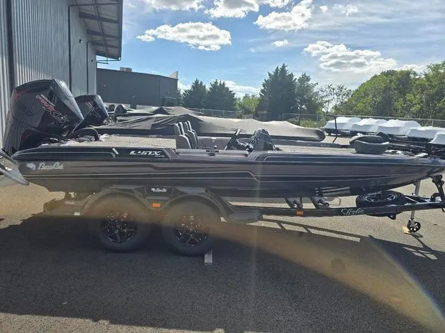 The Image of 2025 Bass Cat Lynx STS boat parked outdoors on a sunny day. - 0