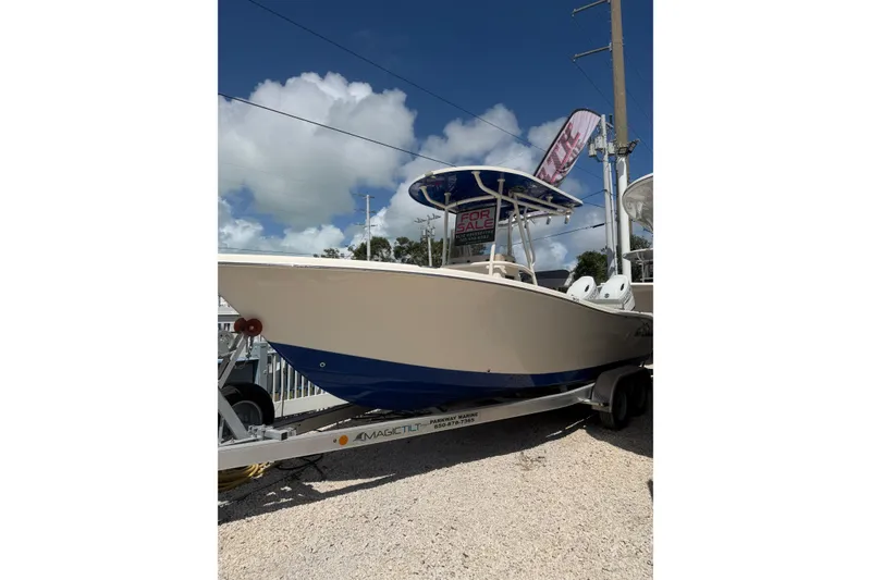 The Image of 2023 Sea Chaser 24 HFC boat for sale on trailer under clear sky. - 1