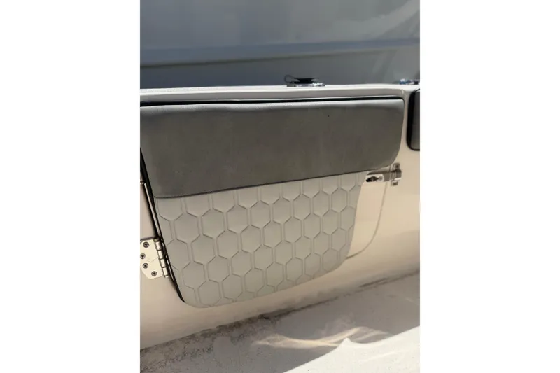 Slide: The Image of 2023 Sea Chaser 24 HFC boat interior with hexagonal pattern upholstery. - 18