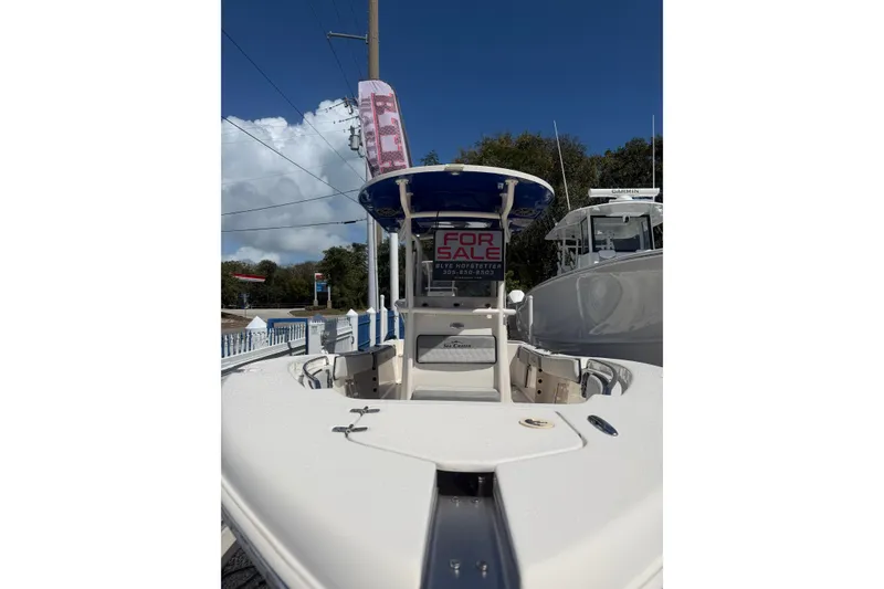 Slide: The Image of 2023 Sea Chaser 24 HFC boat for sale, displayed outdoors under clear skies. - 3