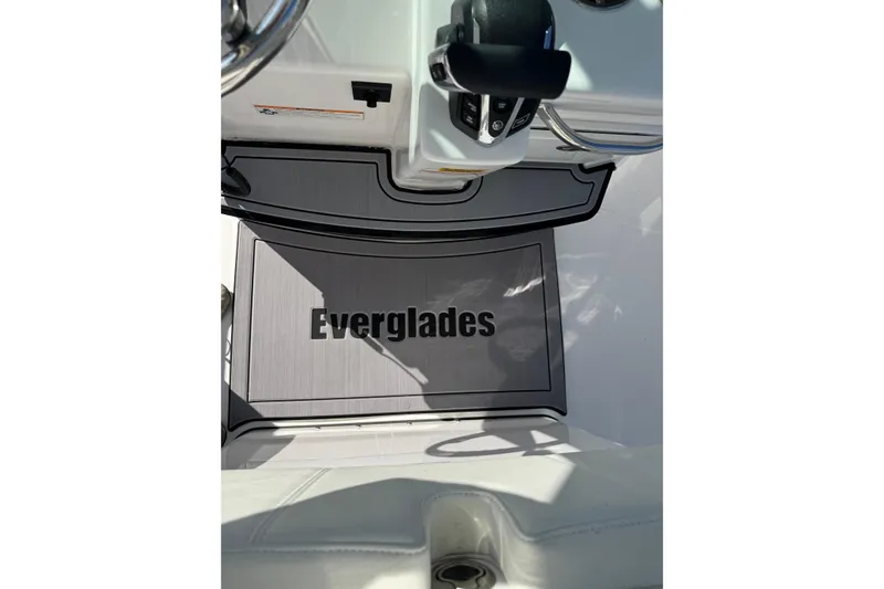 Slide: The Image of 2024 Everglades 235 Center Console boat interior with branded flooring. - 12