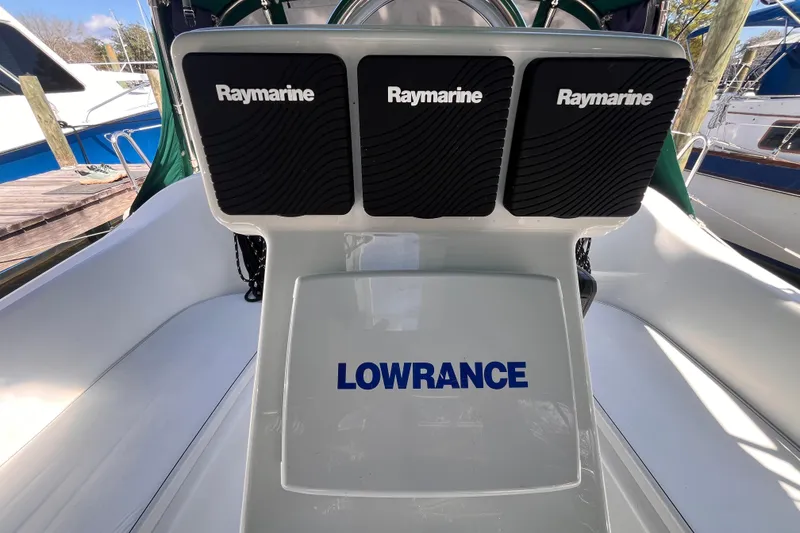 Slide: The Image of Cockpit of 2008 Beneteau Oceanis 343 with Raymarine and Lowrance equipment. - 12
