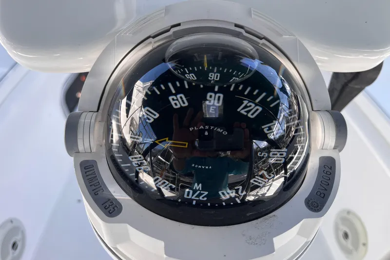 Slide: The Image of Compass on Beneteau Oceanis 343 sailboat, 2008 model, showing navigation details. - 14