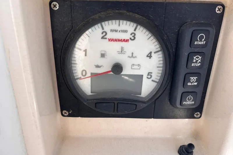 Slide: The Image of Yanmar RPM gauge and control panel on 2008 Beneteau Oceanis 343 sailboat. - 15