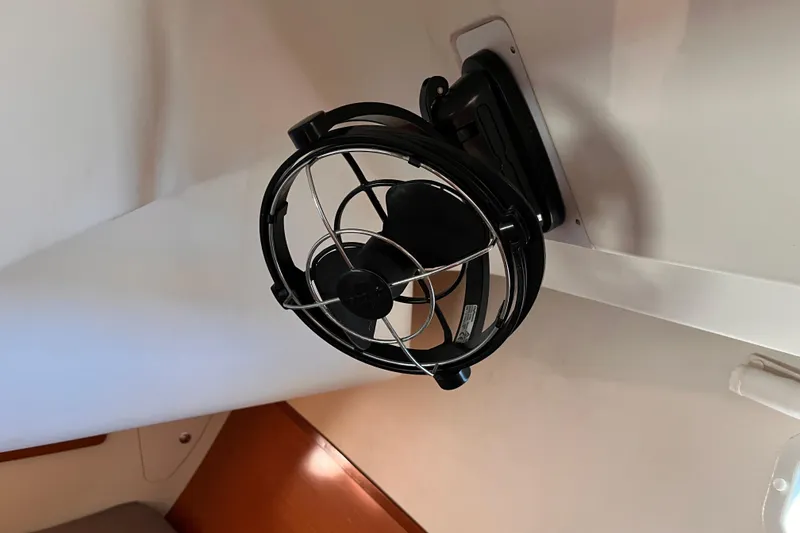 Slide: The Image of Ceiling-mounted fan inside 2008 Beneteau Oceanis 343 yacht cabin. - 23
